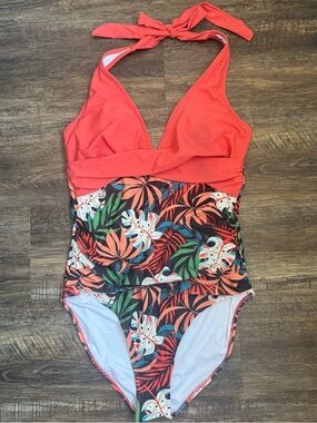 Amazon Coral Halter One-Piece Swimsuit with Tropical Leaf Pattern